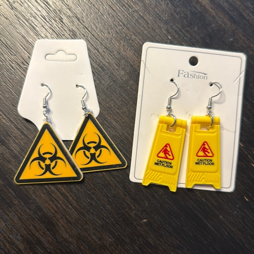 2 pairs women’s fashion jewelry earrings warning bio caution wet floor sign​